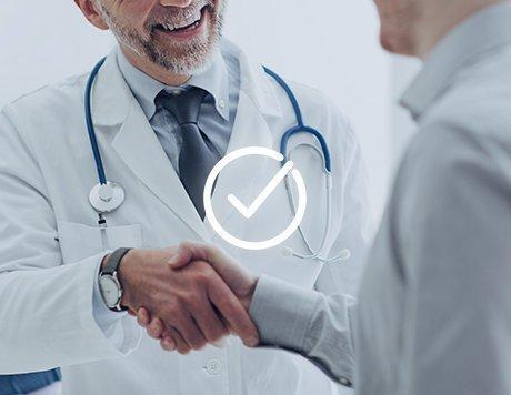 doctor shaking hand with patient